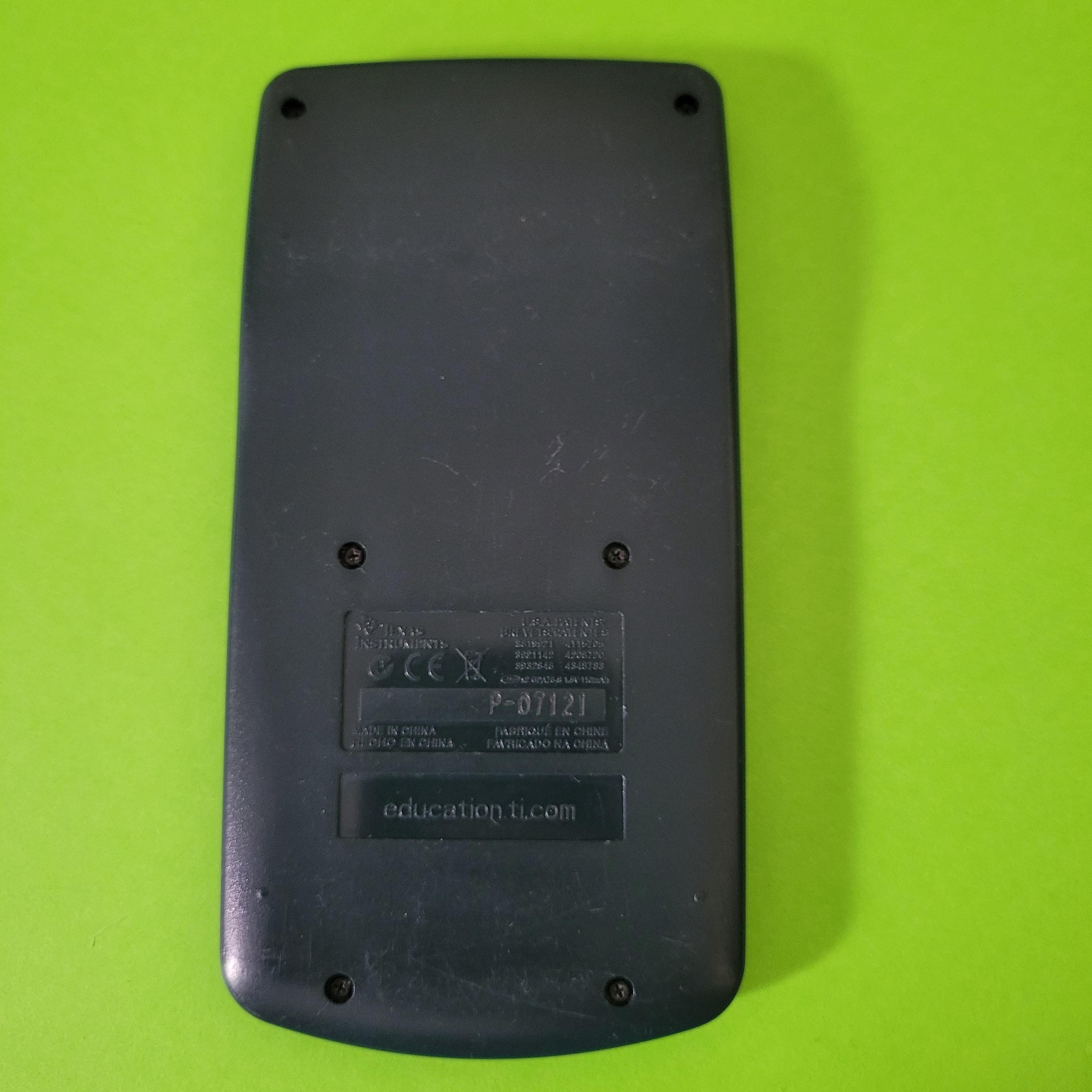 An image of the back of a texas instruments ti-30xa scientific/engineering calculator